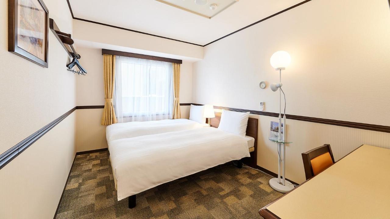 Toyoko Inn Osaka Itami Airport Toyonaka Extérieur photo